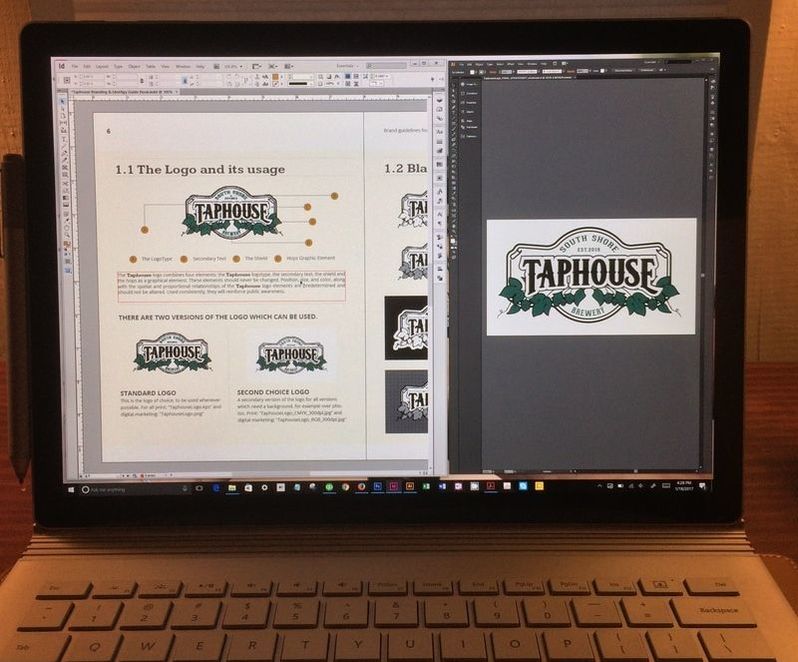 Photo of a computer screen with the Taphouse logo and the brand styling guide layout digital files.